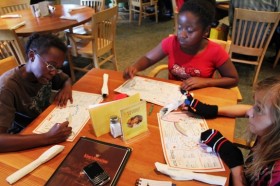 Crayons and Coloring Books at the table