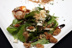 Baked pear salad, topped with Cabrales cheese with sherry vinaigrette