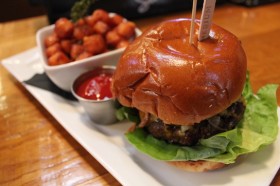 The Federal Burger carries the name of the place without effort. But the Maple-glazed sweet potato tots are a good back up