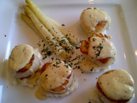 Diver Scallops topped with a saffron sauce and mashed potatoes