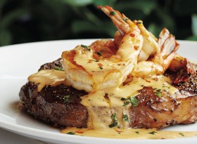 Prime steak topped with diablo shrimp